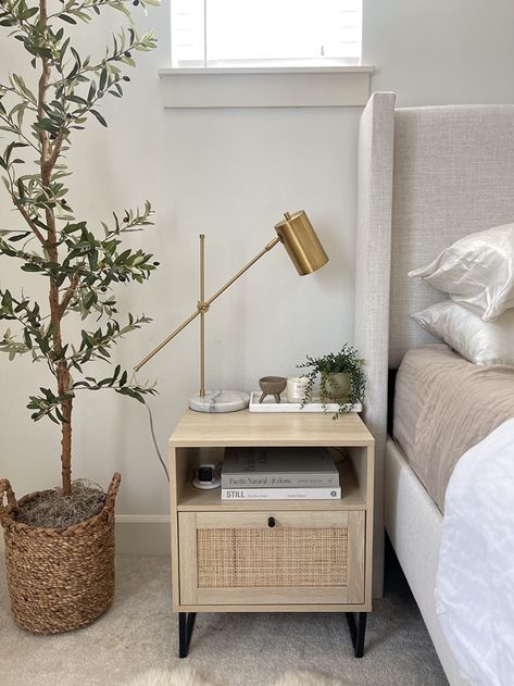 Tan Bedside Table, Bedroom Side Tables Ideas, Neutral Bedroom Bedside Table, Rattan Nightstand Bedroom Ideas, Rattan Bedside Table Styling, Light Wood Nightstand Bedside Tables, Night Stand Organization Ideas, Nightstand Styling Bedside Tables, Rattan Nightstand Bedroom