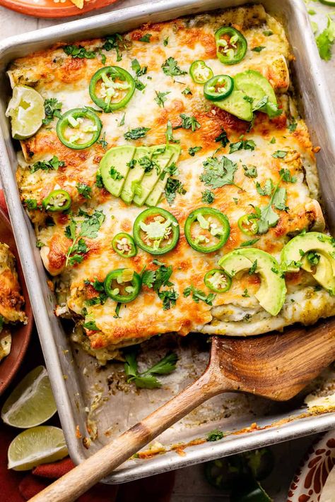 Load up on these Easy Green Chicken Enchiladas for a satisfying and protein-loaded meal. Made with salsa verde and Greek yogurt, these enchiladas put a healthy twist on the dish! Healthy Chicken Enchilada Bake, Easy Creamy Salsa Verde Chicken Enchiladas, Chicken Salsa Verde Enchiladas, Healthy Green Chicken Enchiladas, Green Verde Chicken Enchiladas, Green Enchiladas Recipe, Enchiladas Suizas Verdes, Verde Enchiladas Chicken, Chicken Enchilada Casserole Healthy