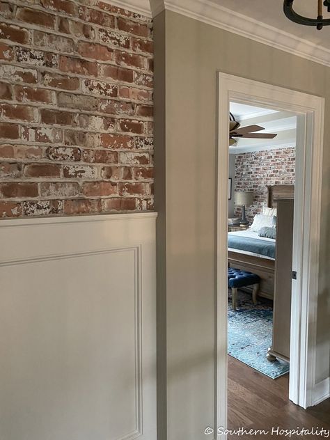 Brick Half Bath, Brick Wall And Panelling, Brick Farmhouse Interior, Rooms With Brick Wallpaper, Half Brick Wall Interior, Wallpaper Hallway Ideas, Painted Brick Interior, Half Brick Wall, Charleston Design