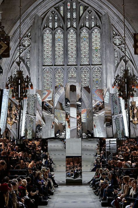 This church setting is proof that Mulberry is religious about achieving good aesthetic. The stunning cathedral, with its intricately stained windows reflected in precisely situated mirrors, was an incredible setting for the brand's show during London Fashion Week. Note: Gothic touches and colored glass make for divine decor. Fashion Show Runway Stage, Fashion Show Stage Design, Runway Aesthetic, Fashion Show Design, Catwalk Design, Fashion Show Makeup, Fashion Show Party, Fashion Show Themes, Fashion Show Poster