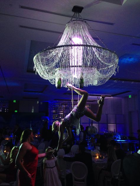 Aerial bartender, chandelier champagne server Aerial Bartender, Events Planning, Bal Harbour, Circus Art, Random Inspiration, Drawing Quotes, Wedding Entertainment, St Regis, Dancing In The Rain