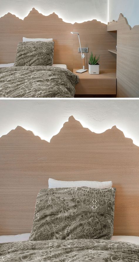 headboard Ideas - Using a mountain range as inspiration, this custom wood headboard with hidden lighting showcases the outline of the mountains and creates a soft glow for the bedroom. #HeadboardIdeas #ModernHeadboard #BedroomIdeas #BacklitHeadboard #ModernBedroom Backlit Mountain Wall Art, Bedroom Ideas Wood Headboard, Mountain Headboard, Mountain Bedroom Ideas, Backlit Headboard, Mystical Bedroom, Cool Headboards, Mountain Bedroom, Vermont House