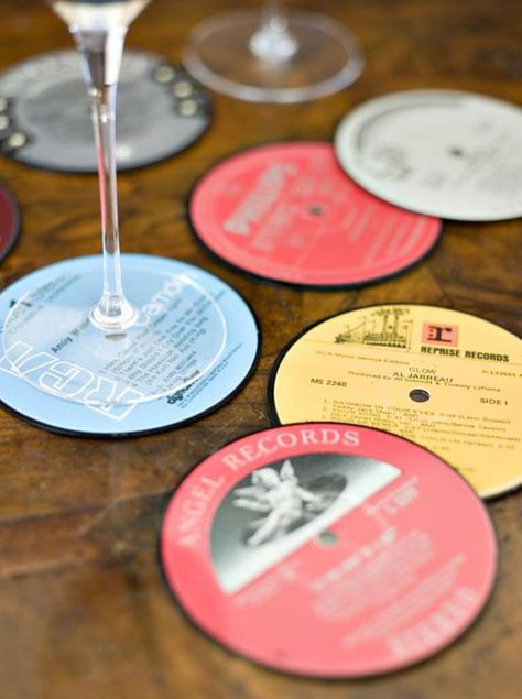 15 Rockin’ Projects that Repurpose Vinyl Records | Brit + Co Vinyl Record Projects, Record Diy, Vinyl Records Diy, Records Diy, Record Coasters, Vinyl Record Crafts, Record Crafts, Old Records, Vinyl Record Art