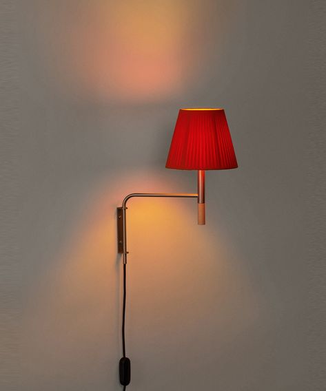 The BC1, BC2, and BC3 wall lamps are shown as an exercise in constructive solidity, aesthetic sobriety, and functional quality. Its different shade options, whether in linen, sewn cardboard, or ribbon, as well as its sober use of materials make them ideal for multiple situations. BC2 is a fixed anchor, while BC1 and BC3 are pivoting, with or without an external power supply. Produced by the Barcelona-based lighting purveyor, Santa & Cole. Greenpoint Apartment, Thunderbird House, Santa And Cole, Red Lamp Shade, Big Lamp, Red Lamp, Santa Cole, Bathroom Light, Cool Lamps