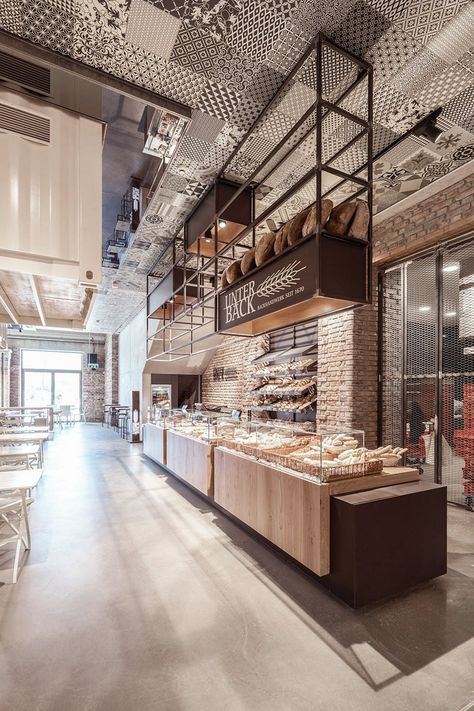 Feast your eyes on these 10 eating & drinking spaces | News | Archinect Bakery Cafe Interior, Bakery Shop Design, Bakery Interior, Industrial Cafe, Bakery Design Interior, Supermarket Design, Coffee Shops Interior, Bakery Design, Modern Restaurant