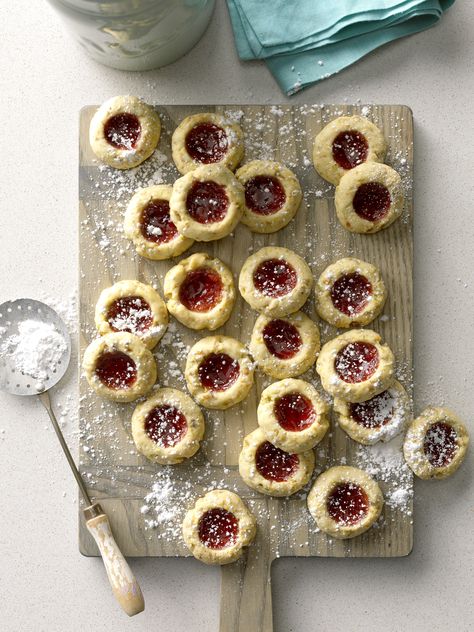 Raspberry Pistachio Thumbprints Recipe from Taste of Home Raspberry Thumbprint Cookies Recipe, Raspberry Pistachio Cookies, Raspberry Thumbprint Cookies Easy, Raspberry Pistachio Desserts, Pistachio Raspberry Dessert, Pistachio Thumbprint Cookies Recipe, Pistachio Thumbprint Cookies, Rasberry Thumbprint Cookies, Baker By Nature Raspberry Cheesecake Thumbprint Cookies