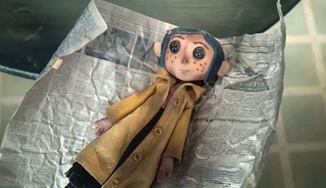 In MK symbolism, dolls represent the slave's alter persona. Coraline will call this doll "Little Me". Black, Coraline, Blue