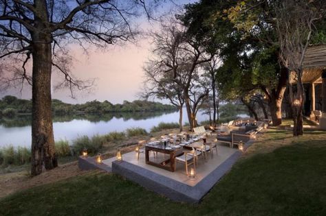 Nestled on an exclusive stretch of the Zambezi River, the exquisite Matetsi River Lodge offers the unique experience of rich views of wildlife as well as captivating experiences of the Victoria Falls. It celebrates the region's fascinating heritage with authentic features and effortlessly... Safari House, Lakeside Cafe, Resort Design Plan, River Restaurant, Lakeside Restaurant, River Hotel, River Resort, Open Restaurant, Hotel Garden