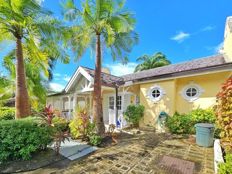 Unveiling Paradise at Porters Court #2: Your Barbados Escape Awaits! Nestled in the heart of Porters St. James, Barbados, Porters Court #2 promises a tropical haven of your dreams.  This charming 2-bedroom, 2 & a half-bathroom chattel-house styled villa, seamlessly blends Bajan charm with modern comfort, offering an unforgettable escape to sun-kissed days and starlit nights. Step inside and be captivated by the light-filled living space.  Cool, tiled floors and breezy windows invite the Caribb Barbados House, Chattel House, St James Barbados, Horizon Painting, Poolside Loungers, Painting The Sky, Beach Shacks, Tiled Floors, Another Day In Paradise