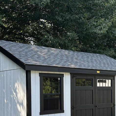 Kloter Farms on Instagram: "Modern farmhouse is a trend we can’t get enough of! Black & white features like these look great on our large custom builds and our smaller storage sheds, like this 12x16 Garden Cape Shed. This photo comes to us from #ontheroadwithkloterfarms in Uxbridge, MA! #kloterfarms #gardencape #capesheddesign #sheddesigns" White And Black Garden Shed, Black And White Shed, 2023 Modern Farmhouse, White Shed, Storage Sheds, Black Garden, Shed Design, White Gardens, House Remodel