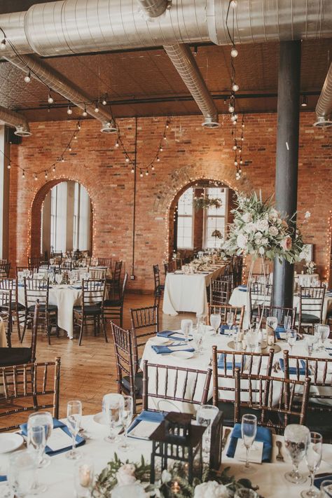 Our rustic romantic wedding venue was a dream. Exposed brick walls and brick arches, a tin ceiling, string lights and gorgeous wood chairs. The head table went through a rustic, romantic brick arch. Our reception was held in Buffalo, New York at Pearl Street, Pearl at the Webb. As a custom wedding invitation designer, I've seen it all and wanted something intimate and unique. For more wedding tips and tricks, visit my website below. #RusticWedding #RomanticWedding #Buffalowedding Wedding With Brick Walls, Old Brick Wedding Venues, Brick Backdrop Wedding, Wedding Decor Brick Wall, Buffalo Wedding Venues, Brick Building Wedding Reception, Wedding Arch Brick Wall, Wedding Reception Brick Walls, Brick Venue Wedding