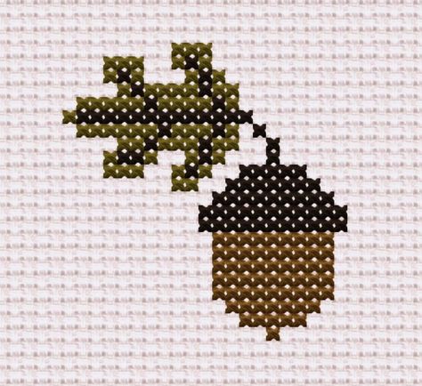 "Autumnal Acorn and Leaf Easy Cross Stitch Chart Embrace the cosy vibes of autumn with our rustic-themed pattern. With its earthy colours and natural elements, this design will infuse your project with warmth and an inviting atmosphere. Aida: 14 count ( 5,5 per cm) Pattern Size: 21 x 22 stitches Finished Size: 1.5 x 1.5 inches ( 4 x 4 cm ) Fabric Color: Ivory (264) Note: This listing is for a digital cross-stitch pattern only. Physical materials are not included. Download includes 1 PDF and 4 JP Cross Stitch Patterns Nature, Autumn Cross Stitch, Cross Stitch Easy, Autumn Cross Stitch Patterns, Cosy Vibes, Fall Cross Stitch, Whimsical Woodland, X Stitch, Easy Cross Stitch Patterns