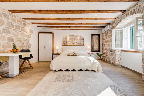 Aug 25, 2018 - Entire home/apt for $58. This delightful studio is in an old stone house situated in a quiet historical district surrounded by typical Dalmatian stone homes. The studio is... Istrian Stone House Interior, Croatia Stone House, Croatian Stone House, Stone Homes, Dalmatian Stone, Clean Bed, Old Stone Houses, Stone Walls, Old Stone