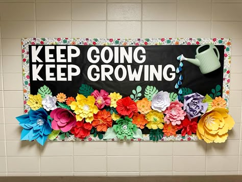 Spring bulletin board. Keep going, keep growing. Art For Classroom Wall, High Five Bulletin Board Ideas, Future Bulletin Board Ideas, Student Growth Bulletin Board, Watch Me Grow Bulletin Board, Garden Birthday Bulletin Board, Together We Grow School Theme, Back To School Flower Bulletin Boards, Color Run Bulletin Board