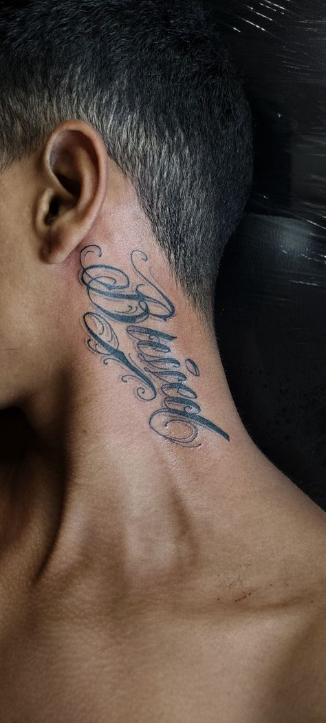 Tattoos For Guys Behind Ear, Gangsta Neck Tattoo, Blessed Behind Ear Tattoo, Blessed Tattoo On Neck, Blessed Neck Tattoo, Cursive Neck Tattoo, Kiss Mark Tattoo, Behind Ear Tattoo Men, Word Neck Tattoos