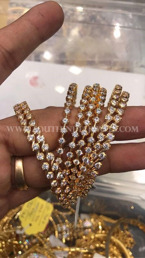 Beautiful 22k gold bangle studded with single row of white stones. Approximate weight is 80 grams. For inquiries please contact the seller below. Seller Name : Premraj Shantilal Jain Jewellers Address : POT MARKET Opp BATA Rp road,Hyderabad, India 500025. Contact No : 9700009000, 9951000005 Website : http://premshantijewels.blogspot.in/ Facebook : https://www.facebook.com/premrajshantilaljainjewellers/ Related Posts50 Grams Gold … White Stone Bangles Gold, Stone Bangles Gold, White Stone Bangles, Premraj Shantilal Jain Jewellers, 22k Gold Bangles, Stone Bangles, Gold Bangle Set, Diamond Wedding Jewelry, Antique Jewelry Indian