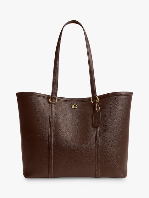 The classic tote reimagined for the new season, pick this trusty piece from Coach. Whipped up from smooth and dreamy leather that's made to last, it fastens with a magnet. Classic Gift Ideas, Coach Bag Brown, Coach Bags Tote, It Bags 2024, Brown Purse Aesthetic, Leather Tote Bag Aesthetic, Cute Bags Aesthetic, Bags For Uni, Handbags For College