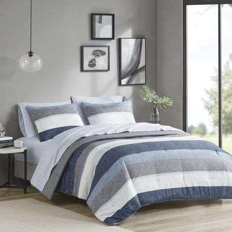 PRICES MAY VARY. Comforter/Shams: 100% Polyester Soft Brushed Microfiber, Printed. Filling: 100% Polyester Sheet Set: 100% Polyester Microfiber, Printed Revamp your bedroom style with the Madison Park Essentials Jaxon bed in a bag, comforter and sheet set Stripe comforter look in grey, navy, blue for casual and modern bedroom style with simple coordinating stripe design on sheet set Enjoy the soft microfiber that is an ultra-fine fiber, lightweight and durable fabric for all season comfort, OEKO-TEX labeled textile certified as safe on skin Set include: 1 Comforter: 90"W x 90"L, 2 Standard Shams: 20"W x 26"L, 1 Flat Sheet: 90"W x 102"L, 1 Fitted Sheet: 60"W x 80"L + 14"D, 2 Standard Pillowcases: 20"W x 30"L Care Instructions: Machine washable for easy care; comforter set may come in rolled Modern Comforter Sets, Modern Comforter, Full Comforter Sets, Modern Style Bedroom, Twin Comforter Sets, Blue Sheets, Twin Mattress Size, Twin Comforter, Bedroom Style