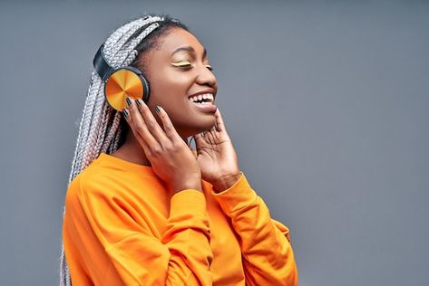 African woman singing while listening to... | Premium Photo #Freepik #photo #black-woman #pretty #afro-woman #beautiful-woman Church Media Design, Woman Singing, Women Laughing, New Background Images, For You Song, Dark Clouds, Girls Music, African Girl, Girls Braids