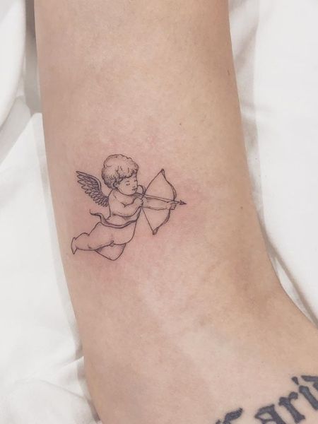 20 Angel Tattoos for Men of Faith (2021) - The Trend Spotter Little Tattoos, Cupid Tattoo, Cherub Tattoo, Dibujos Tattoo, Muster Tattoos, Inspiration Tattoos, Cherub Angel, Dainty Tattoos, 문신 디자인