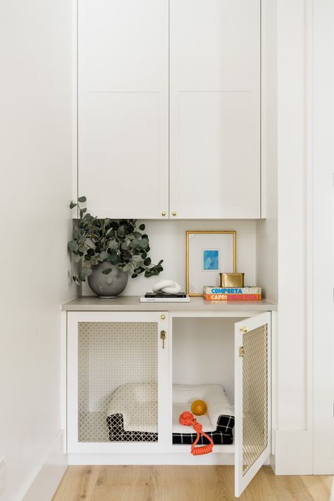 Our clients' pets are part of the family, and they deserved their own special space! So, we came up with a design for built-in dog crates in our #dawnriverproject master bedroom! The crates are finished with brass mesh cabinet inserts for a chic look. #daleyhome #atxhome #austininteriordesigners #interiordesigneraustin #interiordesign #austinhome #dawnriver Entryway With Dog Crate, Cabinet Dog Door, Built In Pet Space, Dog Crate Cupboard, Closet With Dog Crate, Dog Cage Built In Cabinet, Build In Dog Crate, Dog Bed Cabinet, Dog Kennel Mudroom