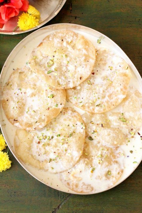 Paal poli recipe, a classic South Indian dessert where pooris are dunked in cardamom flavored, reduced sweetened milk #sailusfood #indiandessert #paalpoli #southindianfood #diwalisweet #diwali #indianfood Sweet Puri Recipe, South Indian Sweets, Diwali New Year, Poli Recipe, South Indian Dishes, South Indian Recipes, Diwali Sweets, Diwali Food, Indian Dessert