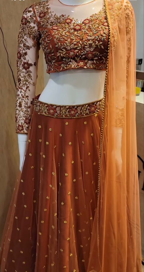 WhatsApp on 9496803123 to customise your handcrafted designer bridal wear with us online. Book your appointment today. We do ship internationally. (Pics for reference) Orange Lehenga Blouse Designs, Gown To Lehenga Ideas, Handmade Lehnga Designs, Lehenga Designs Trendy, Leghana Design For Reception, Designer Dresses Couture, Lengha Blouse Designs, Orange Lehenga, Function Dresses