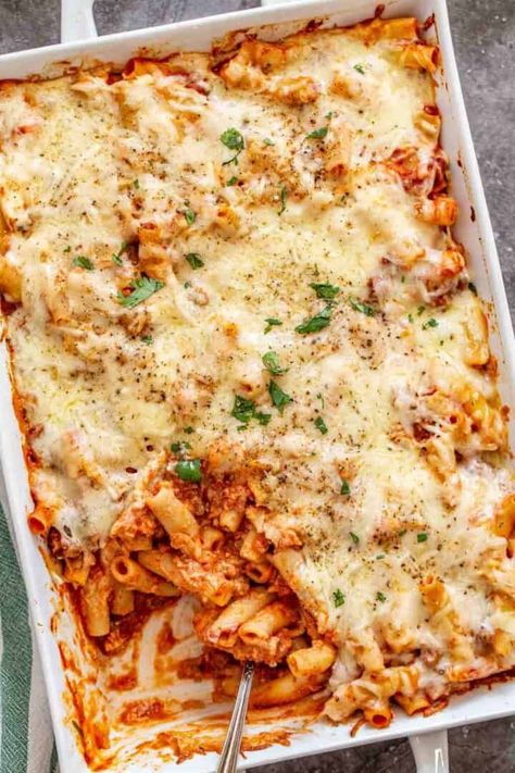 This meaty baked ziti with ricotta is the perfect comfort food. Cheesy pasta made flavorful with tender beef chunks. This casserole takes little prep and the results are incredible! Easy Baked Ziti With Ground Beef And Ricotta, Easy Baked Ziti With Ground Beef, Baked Ziti With Ground Beef And Ricotta, Recipe With Ricotta Cheese, Ground Beef Ricotta, Baked Ziti With Ground Beef, Recipe With Ricotta, Pasta Ground Beef, Baked Ziti With Ricotta