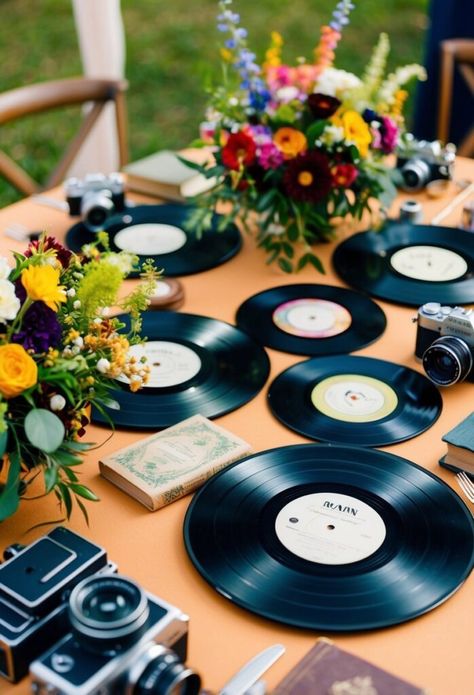 I love using vinyl records as unique decor for vintage eclectic weddings. Old records make great table centerpieces when propped up in stands. I sometimes pair them with vintage record players as fun focal points. Vinyl Record Wedding Centerpieces, Vinyl Centerpieces Wedding, Record Centerpieces Ideas, Eclectic Wedding Decor, Vintage Eclectic Wedding, Vintage Record Players, Vinyl Record Display, Vinyl Aesthetic, Vintage Record Player