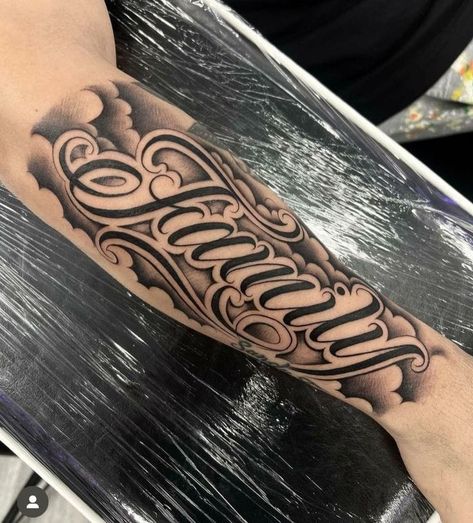 Four Arm Tattoo For Men, Inner Bicep Name Tattoo Men, Rip Tattoos For Women Forearm, Mexican Font Tattoo, Self Made Tattoo Design, Last Name Forearm Tattoo Men, Last Name Tattoos For Men On Forearm, Loyalty Tattoo For Men, Name On Arm Tattoo