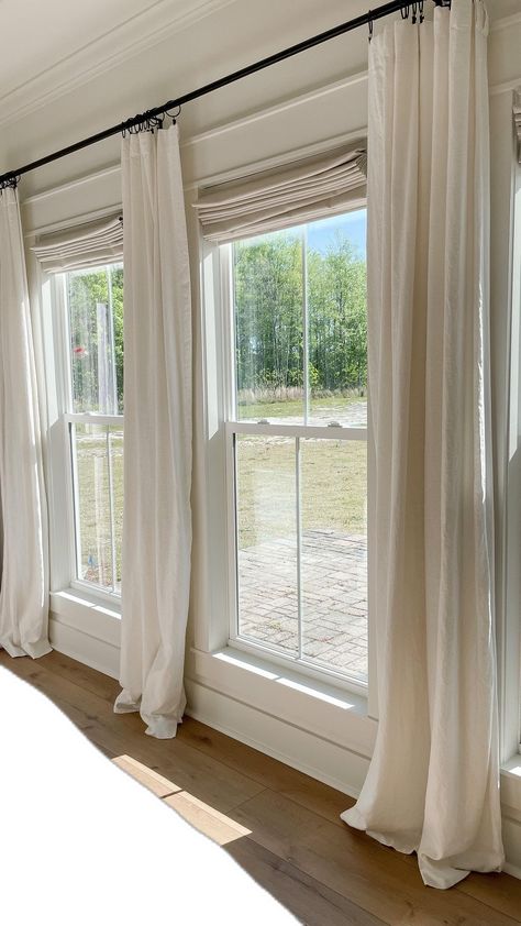 Curtain For Three Windows, House Of Keene, Curtains Wall Of Windows, Curtains Between Windows, Window Placement Ideas Living Rooms, Curtains For Side By Side Windows, Cozy Window Treatments, Two Window Curtain Ideas, Curtains Picture Window