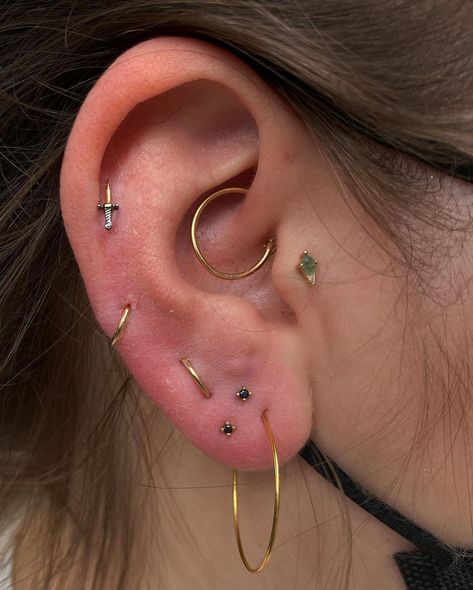 @piercedbyjohn on Instagram: “Started my day off with some stacked lobes and added some gold rings to turn old piercings into something a lil different.” Lobe Stack Piercing, Piercing Both Ears, Stacked Piercings Lobe, Stacked Lobe Piercing Ideas, Triangle Lobe Piercing, Triangle Ear Piercing, Stacked Ear Lobe Piercing, Stacked Lobe Ear Piercings, Ear Piercing Stacks