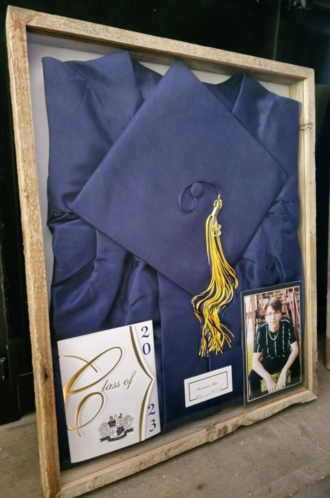 Graduation Cap Display Ideas, Storing Graduation Cap And Gown, Shadow Box Cap And Gown, What To Do With Cap And Gown After Graduation, Shadow Box Graduation High Schools, How To Store Graduation Cap And Gown, Graduation Gown Shadow Box Ideas, Graduation Picture Decoration Ideas, Framed Cap And Gown Graduation