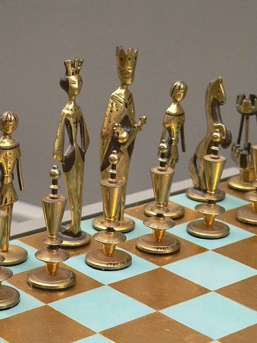 Chess set depicting medieval figures with a contemporary theme France 20th century CE | by mharrsch Gold Chess Set, Chess Boards, Chess Set Unique, Chess Master, Vintage Chess Set, Check Mate, Atomic Era, Chess Players, Chess Sets