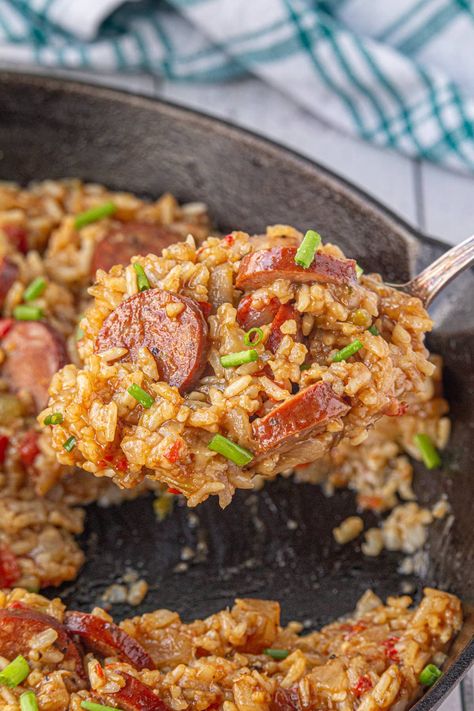 Looking for a hearty and flavorful meal? Try this Smoked Sausage Jambalaya! Packed with savory sausage, rice, and a perfect blend of spices, this easy-to-make Southern classic is sure to become a family favorite. Pin it now and enjoy a delicious dinner tonight! Smoked Sausage Red Beans And Rice, Easy Crockpot Jambalaya, Sausage Jumbalaya Recipe, Jambalaya Sausage Recipe, How To Cook Andouille Sausage, Hot Sausage Link Recipes Dinners, Spanish Rice And Sausage, Hawaiian Sausage Recipes, Smoked Sausage Stir Fry