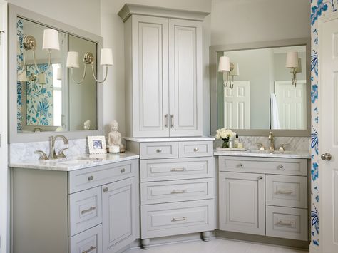 Beautiful bathroom features gray his and hers vanities topped with white marble under gray mirrors illuminated by Reed Single Sconces flanking corner center console cabinet stacked over gray dresser. Corner Bathroom Cabinet, Traditional Bathroom Decor, Corner Bathroom Vanity, Bath Trends, Bathroom Cabinets Designs, Traditional Bathroom Designs, Bathroom Sink Cabinets, Large Bathroom, Transitional Bathroom