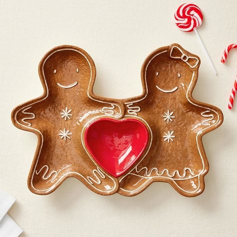 Seasonal treats taste even sweeter served on our vintage-style platter. The glazed, ceramic piece features a cute gingerbread couple conjoined by a red heart and detailed with hand-painted swirls and snowflakes. Dishwasher-safe for easy care, it adds cheery charm to holiday entertaining. DETAILS THAT MATTER Divided platter is made of stoneware. Plate is divided into 3 sections. Features a hand painted glaze finish. Meet FDA requirement. KEY PRODUCT POINTS Pottery Barn Kids decal artwork is exclusive. Sold individually. Top-rack dishwasher safe. Microwave safe. Food safe. Imported. 3 Piece Ceramic Set, Ceramic Advent Calendar, Christmas Ceramics Ideas Pottery, Cool Ceramics Projects, Christmas Pottery Ideas, Handprint Pottery, Food Pottery, Painted Pottery Plate, Food Ceramics