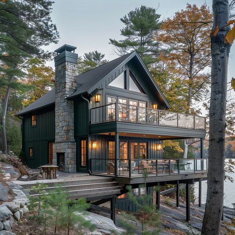 Image Dark Green Lake House, Dark Blue Lake House, Adirondack Style Homes, Modern Lakefront Homes, Small Lake House Exterior Cottage, Blue Lake House, Modern Rustic Lake House, Minnesota Lake House, Modern Home In The Woods