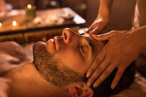 Close-up of a man receiving facial massage at the spa. Massage, Facial, Spa