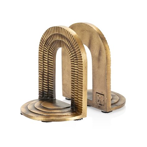 PRICES MAY VARY. (2) DECORATIVE BOOK ENDS: Set of 2 stylish bookends featuring an intricate layered brick arch pattern. Each bookend stands 5" wide x 6" tall, just the right size for displaying books on wall shelves or in bookcases. BRICK ARCH DESIGN: Each bookend is a sculptural piece inspired by ancient and modern architecture. The recessed arches create a beautiful layered design that leads us through the center portal. RUSTIC ANTIQUE BRASS FINISH: Made from solid cast iron metal & given an a Books On Wall, On Wall Shelves, Arch Pattern, Displaying Books, Brick Arch, Decorative Bookends, Arch Design, Book Ends, Air B And B