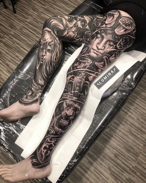 #liontattoo | Art Dodepras Lumina Tattoo, Heaven Back Tattoo, Chicano Leg Tattoo, Chicano Sleeve, Tattoo Pierna Hombre, Rock Tattoos, Tattoo Perna, Best Leg Tattoos, Girl Thigh Tattoos