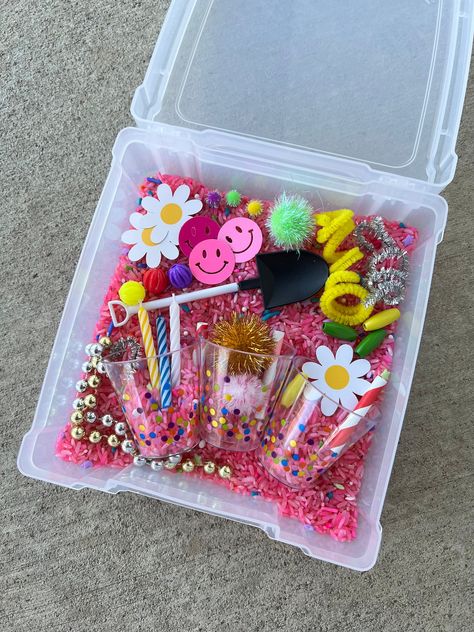 Rice Sensory Kit 💕Handmade colored rice.  💕Each kit may very slightly from kit to kit.  💕 Great part of a rice sensory kit is that it never goes bad, unlike play dough.  💕Bags: Kit comes in a clear fronted zip bag, 1 cup of colored rice, & the same sensory play filler.   💕Bins: Kit comes in a 6x6 plastic box with an attached lid for easy set up and clean up, 1.5 cups of colored rice, & the same sensory play filler.  💕Small parts, could be a chocking hazard for small children 3 years old and younger. Children should use these kits under adult supervision. 💕Can make a custom kit of your choosing. Just send me a message.  💕Spend $35 or more and get free shipping in my shop.  ❤️ Thank you for supporting my small business. Birthday Sensory Bin, Ice Cream Sensory, Play Doh Kits, Raising Wildflowers, Slime Kits, Sensory Kits, Sensory Dough, Toddler Class, Sensory Crafts