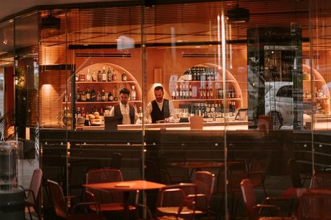 Nook Projects | @barquattro_waverton by @melistudio⁠ ⁠ The Bar Quattro establishment seamlessly merges the ambiance of a neighbourhood local with the charm of a European wine bar. Among its many features, the Kymi Wall Lights stand out, effortlessly blending into the orange walls of the bar. ⁠ ⁠ Crafted from plaster, these lights offer versatility, allowing them to be painted over to match the surrounding décor, as seen here with the burnt orange hue. They exude a timeless architectural elega... Romantic Wine, Cocktail List, Orange Walls, Executive Chef, Wine And Liquor, Beer Garden, Wine List, Rooftop Bar, Signature Cocktail