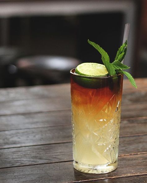 The classic Dark and Stormy is a summertime staple that matches the molasses-rich flavors of dark rum with the spice of ginger beer. Lime juice can be adjusted to taste, but at The Stables Bar in Australia, they squeeze about half a lime for best results. Dark Rum Cocktails, Resep Koktail, Ginger Beer Cocktail, Beer Cocktail Recipes, Rum Cocktail Recipes, Beer Cocktail, Dark And Stormy, Drink Bar, Rum Cocktails