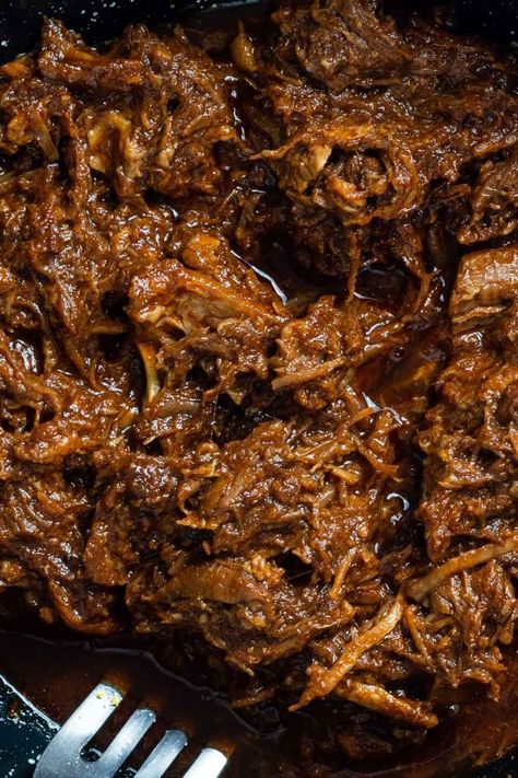 The Best Beef Barbacoa Recipe Ever (Crockpot) - RecipeMagik Barbacoa Dutch Oven Recipe, Easy Barbacoa Crock Pot, Barbacoa Sauce Recipe, Cheek Meat Barbacoa Crockpot, Beef Cheeks Recipe Barbacoa, Authentic Mexican Barbacoa Recipe, Spanish Beef Recipes, Barbacoa Authentic, Barbacoa Crock Pot Mexican Authentic