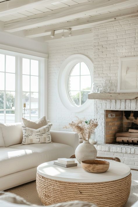 10 Unique Coastal Fireplace Ideas - Casually Coastal Small Living Room With Brick Fireplace, Modern Coastal Fireplace, Coastal Fireplace Ideas, Whitewash Brick Fireplace, Fireplace Between Windows, Coastal Cozy, Whitewashed Brick, White Wash Brick Fireplace, Coastal Fireplace