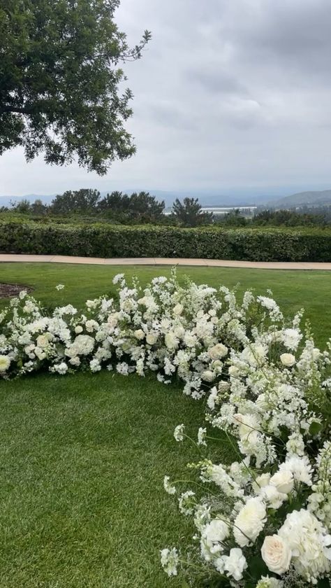 Lily Roden Floral Studio | Spring has been a little too cloudy for me but beautiful nonetheless ✨ | Instagram Floral Arrangement Wedding Ceremony, Wedding Flowers On Ground, Non Arch Wedding Ceremony, Wedding Ceremony Florals On Ground, White And Green Ceremony Flowers, Grounded Wedding Arch, Grounded Flower Arch, Grounded Arch Wedding Ceremony, Spring Southern Wedding