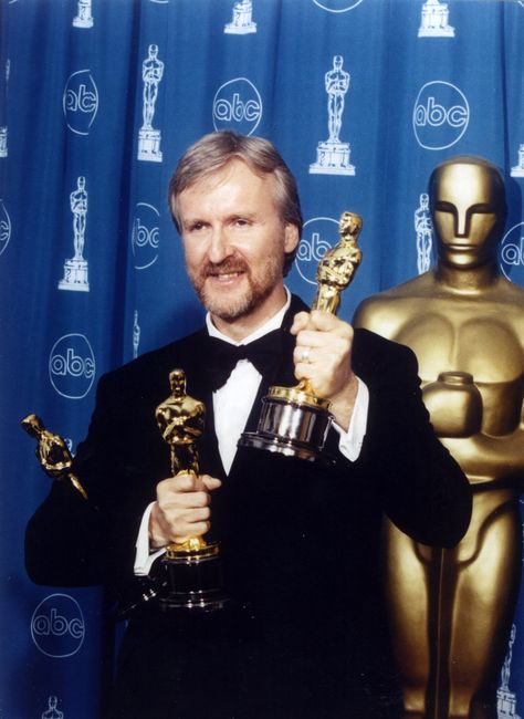 James Cameron poses with his three Oscars backstage for the press at the 70th Academy Awards - March 23, 1998.  For his work on "Titanic", Cameron won Best Director and was co-winners for Best Editing and Best Picture. Movie Color Palette, Douglas Fairbanks, California State University, Avatar The Way Of Water, Film Life, Oscar Award, Movies By Genre, Best Director, Most Popular Movies