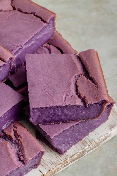 This Ube Butter Mochi is a fun Filipino twist on Hawaiian Butter Mochi. It's chewy, slightly crisp, and infused with the sweet, nutty flavor of ube. Ube Butter Mochi, Ube Butter, Palitaw Recipe, Hawaiian Butter Mochi, Vegan Kfc, Kfc Fried Chicken, Breaded Tofu, Ube Recipes, Tofu Chicken