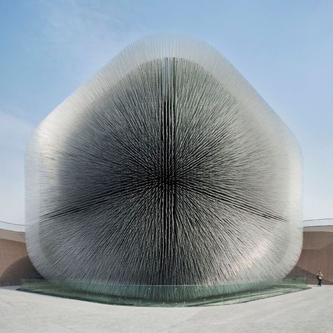 Inspired by this incredible building, which is actually a seed bank!  Click to discover the architect who used out-of-the-box thinking and the simplicity of one idea to create the Seed Cathedral, a piece of extraordinary architecture. #thomasheatherwick #seedcathedral #architecture #thesplashlab Memorial Architecture, Thomas Heatherwick, Architect Design House, Architectural Photographers, Unique Buildings, Building Structure, Structure Design, Sustainable Architecture, Architectural Inspiration